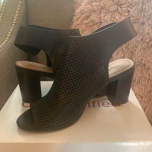 City classified perforated Black mule block heels size 8 , worn once .